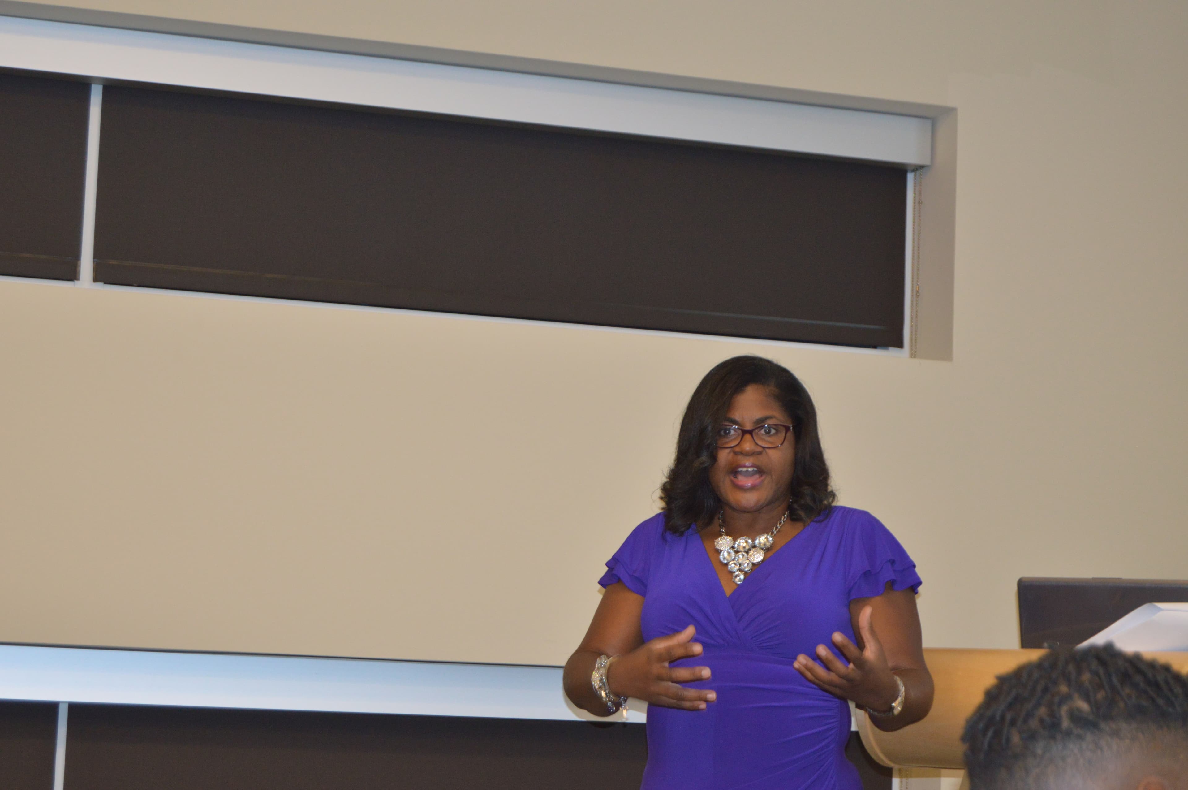 Dr. J at a speaking engagement